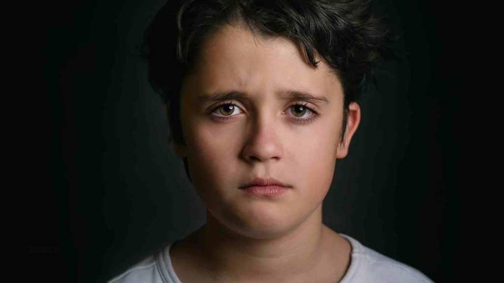 boy looking sad